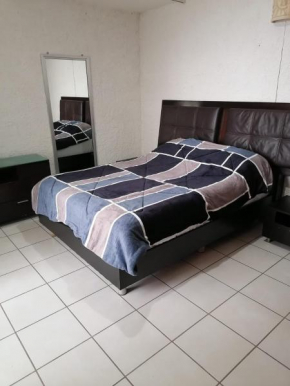 Amplia y Acogedora Habitación